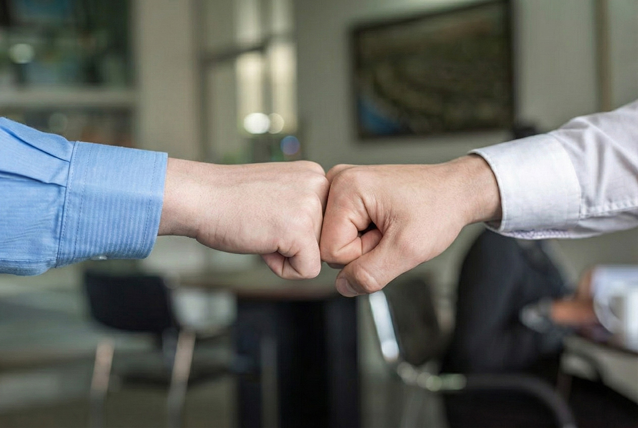 Local IT and VOIP consultant explaining technology to a small business owner